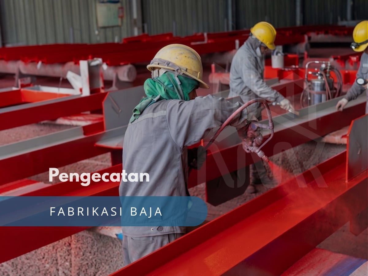 Worker painting a steel beam in the fabrication workshop